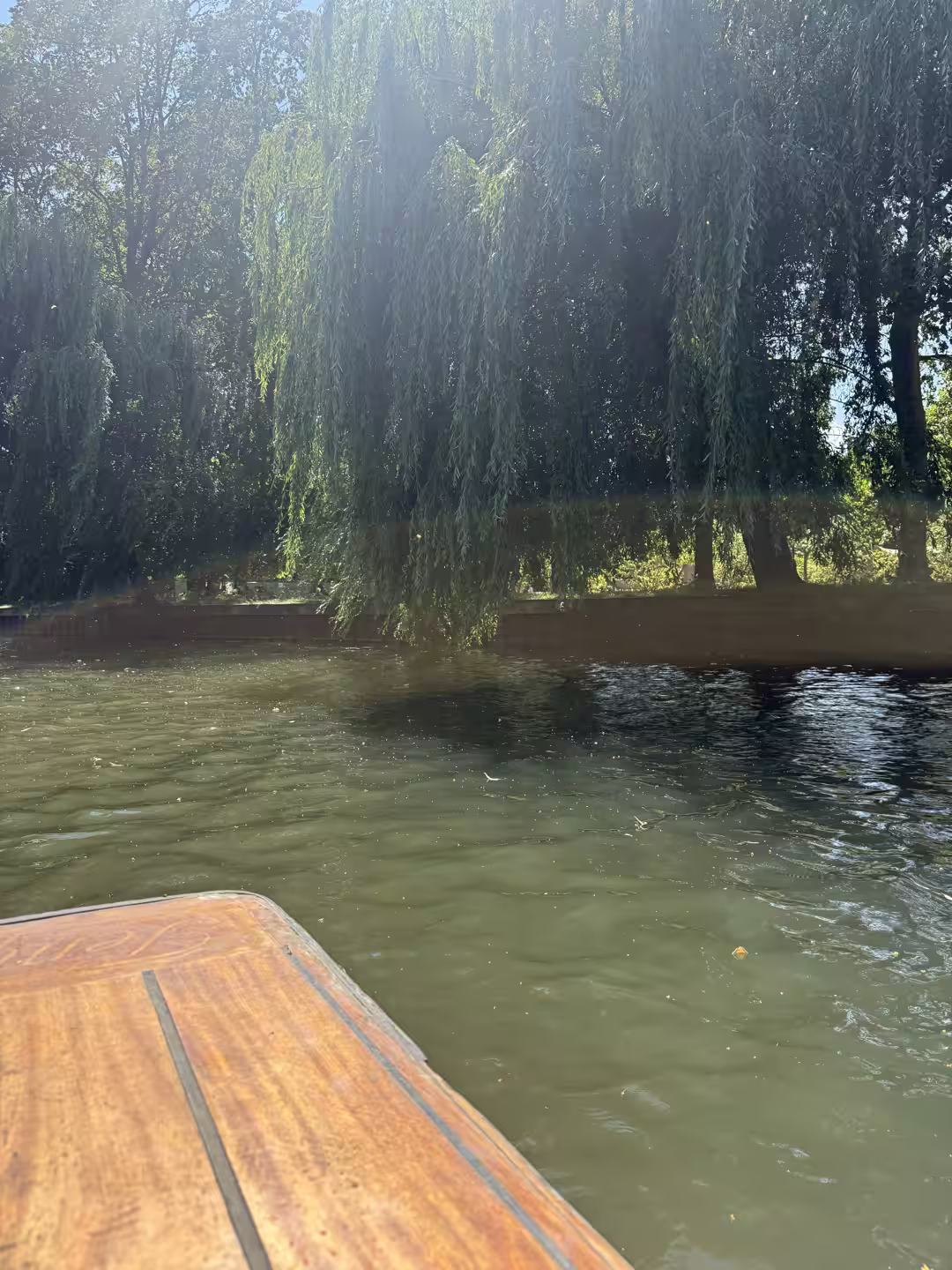 Close view of a wooden punt on the River Cam, Cambridge